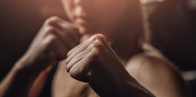 Woman with raised fists